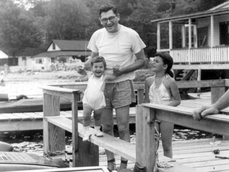 Father with kids on dock